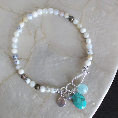 White dendritic agate bracelet with charms