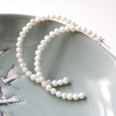White pearl hoop earrings